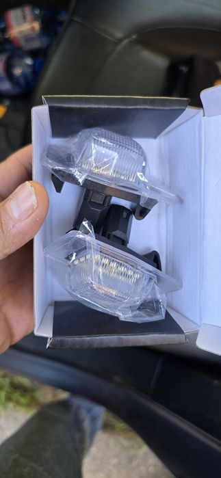 Светлини за номера на Mazda