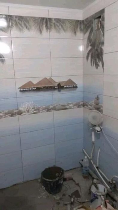 Укладка кафеля.услуги кафельщика