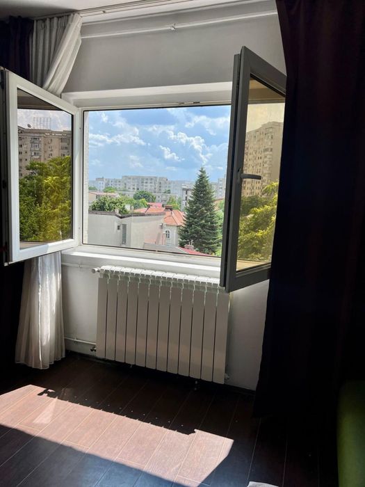 INCHIRIEZ Apartament DECEBAL cu Centrala Termica si loc de parcare