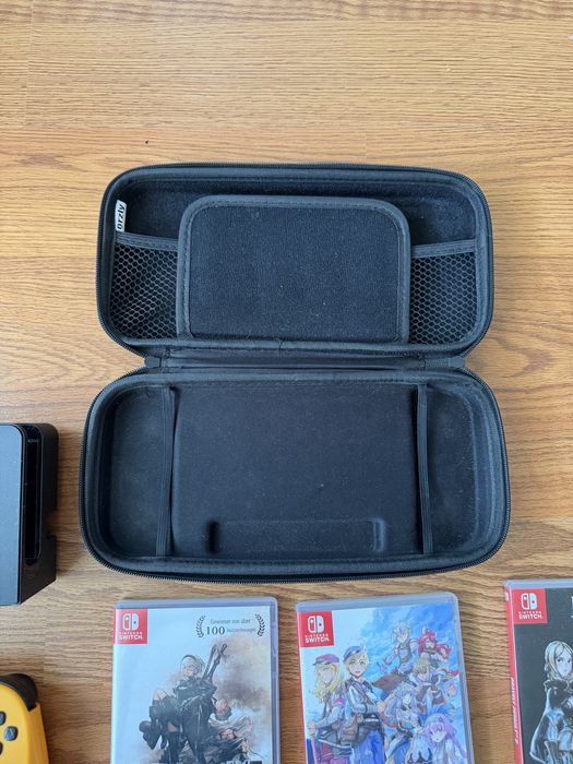 Nintendo Switch OLED + 9 jocuri + accesorii
