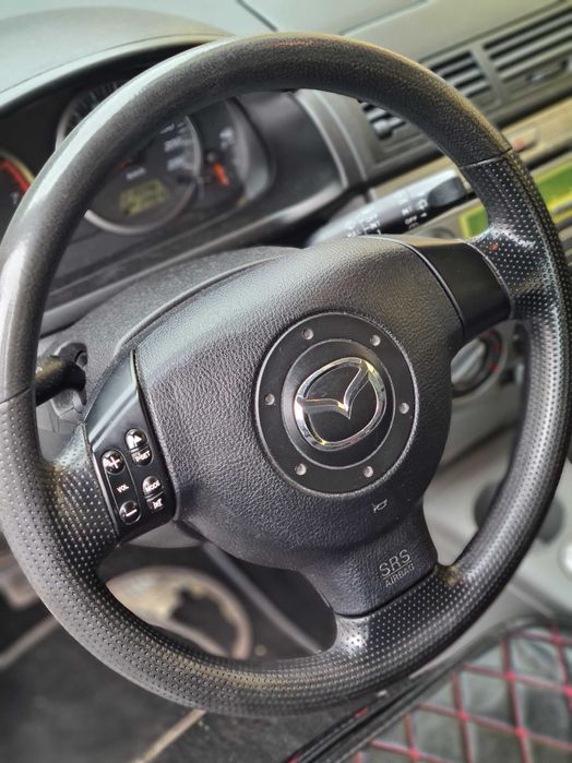 Mazda 2,an 2004 benzină