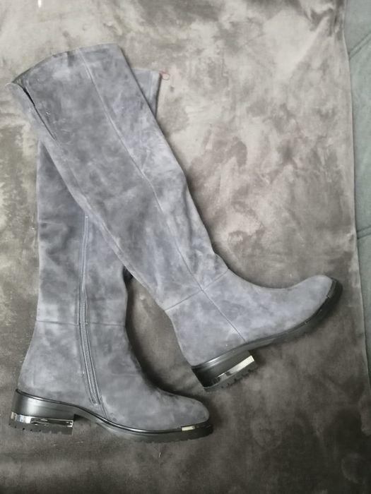 Продам женские сапоги