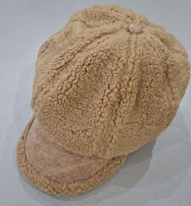 Дамска пухена шапка