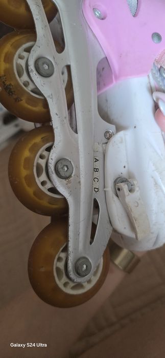 Роликовые коньки