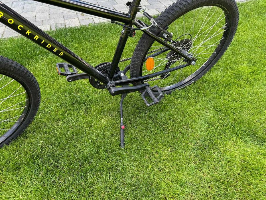 Bicicletă copii Rockrider ST 100 (24 inch, 9-12 ani), stare excelentă + cric inclus