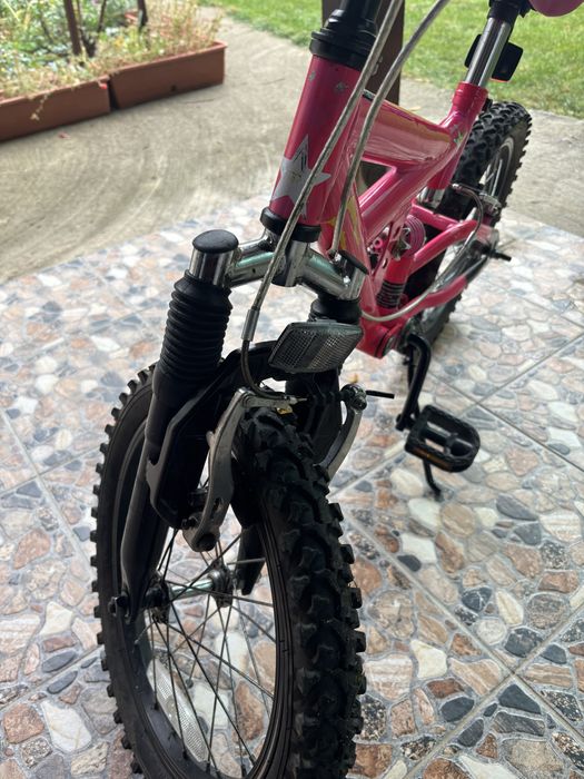 Bicicleta fete cu suspensii fata spate
