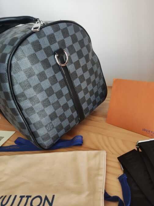 In stoc voiaj, geanta sport piele Louis Vuitton 1109.13