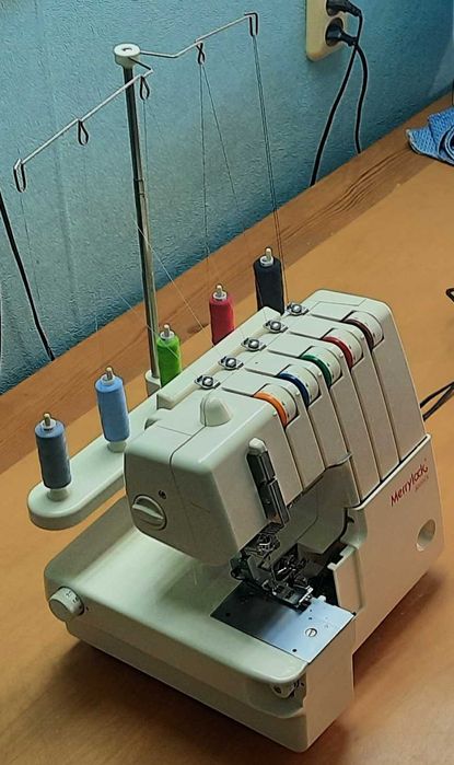 Коверлок Merrylock model 3000CL