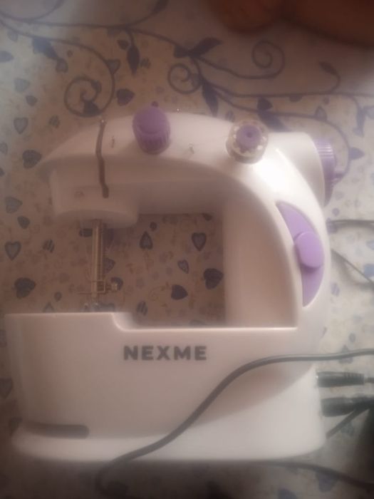 Продам швейную машинку 7000