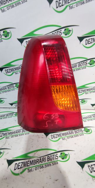 Lampa / Tripla stop stanga pe aripa Dacia Logan prima generatie
