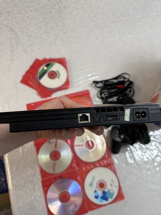 PlayStation 2 Slim yangidek holatda