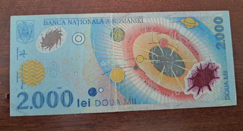 Bancnota 2000 lei eclipsa 1999!