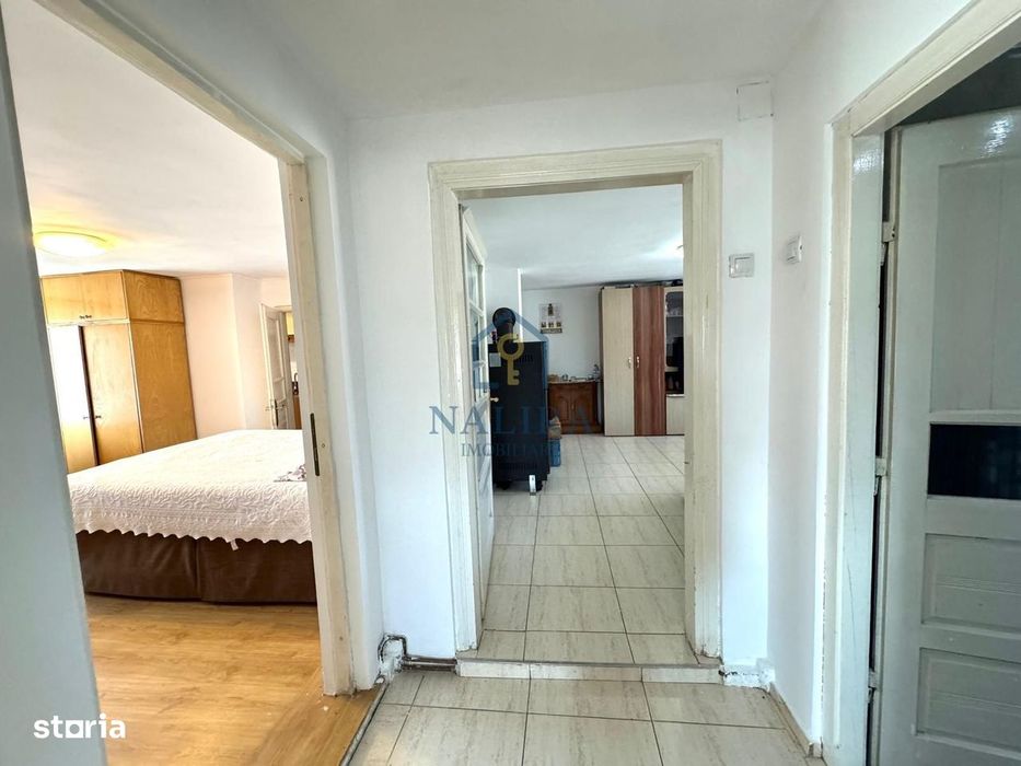 Casa de caramida de vanzare Surdesti cu teren intravilan 5000mp