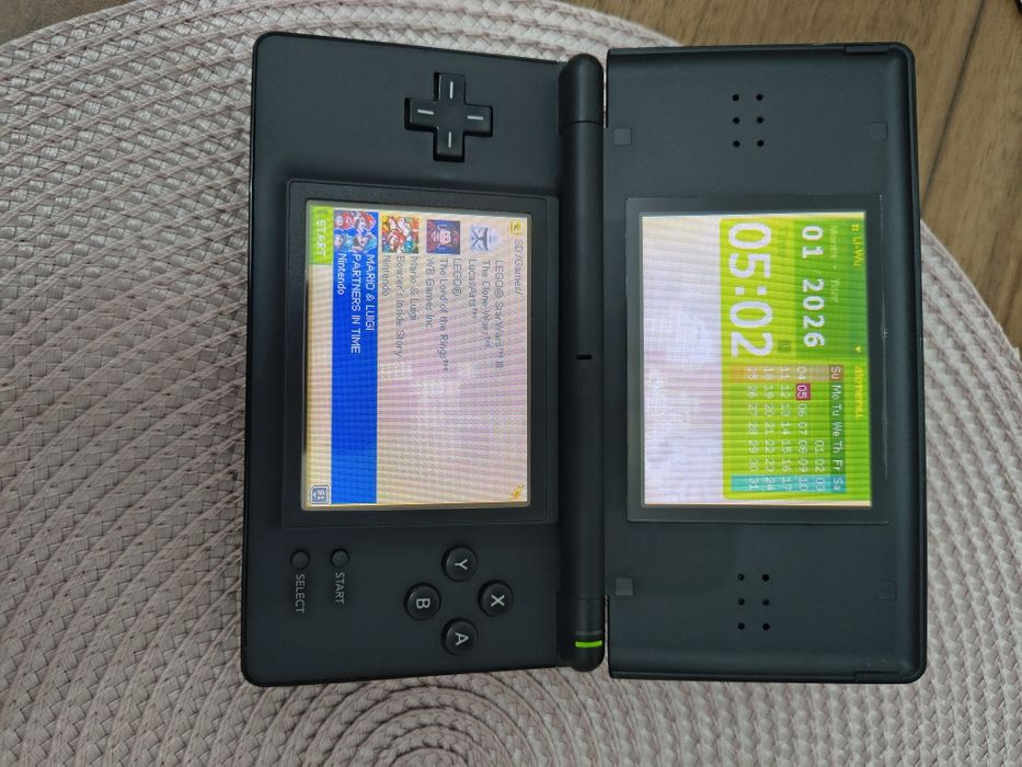 Nintendo DS Lite, cablu alimentare, modat card 64gb