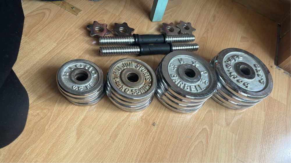 Гантели примерно 13-14 кг