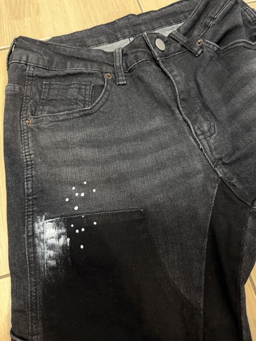 Blugi flared cu pete de vopsea marimea xs