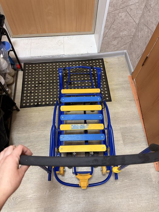 санки на колесиках