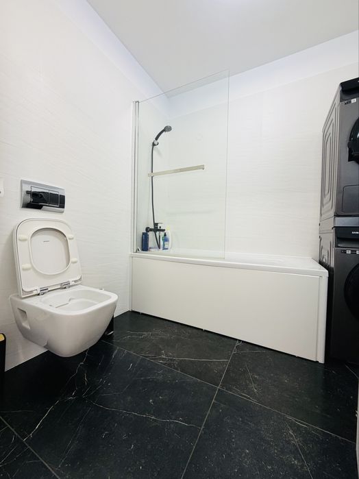 Apartament 2 camere + grădină proprie 70 mp + 2 locuri de parcare