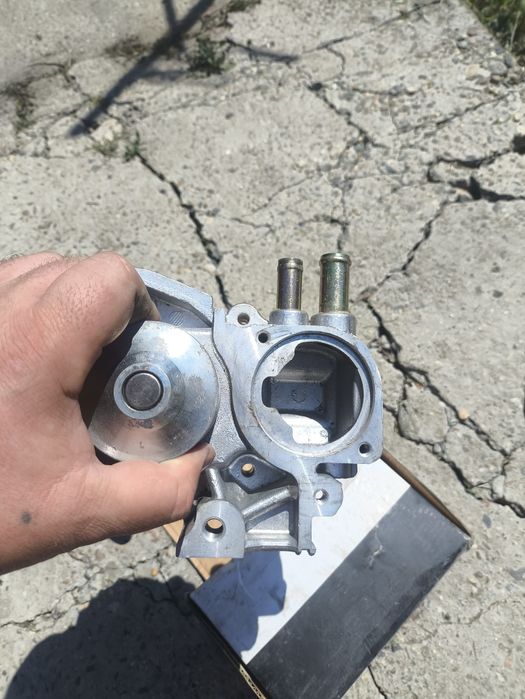 Продам помпу и ролик Subaru