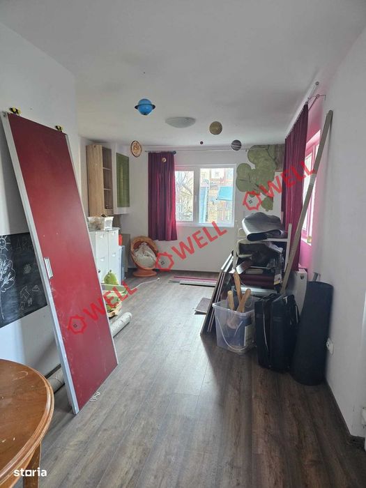 Casă din lemn de vânzare pe teren de 896 m²!