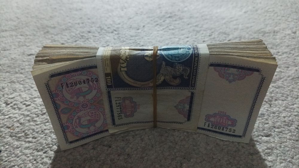 Ишлатилган 100 сўмлик купюра