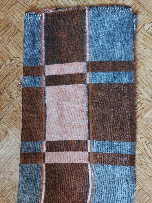 Вълнено и синтетично одеяло