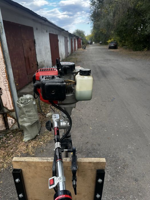 Лодочный мотор (тример)