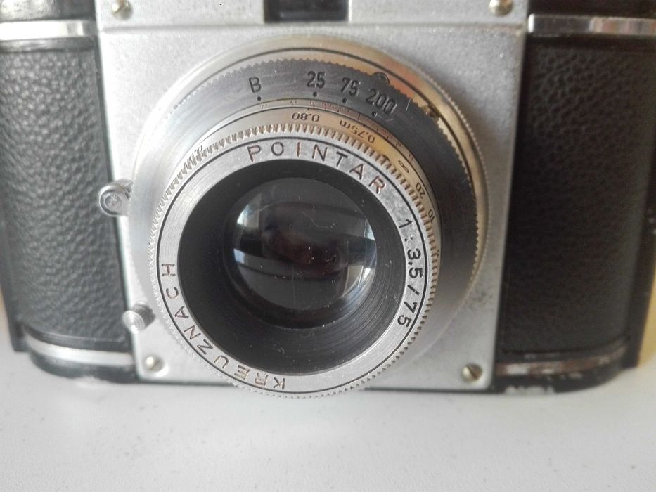 Три ретро фотоапарата.