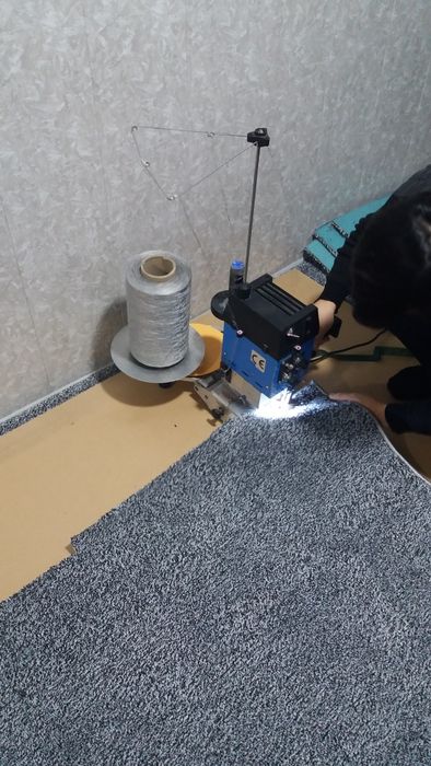 Gilam kesish va tikish turgan joyida