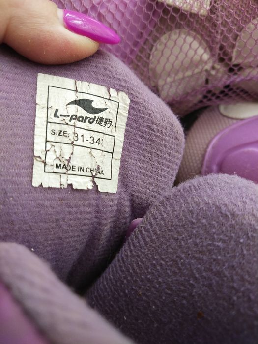 Роликовые коньки