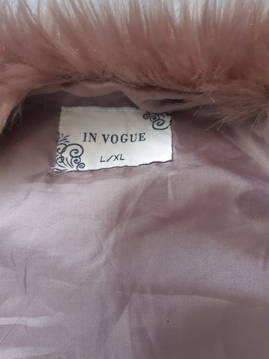 Пухен елек      .