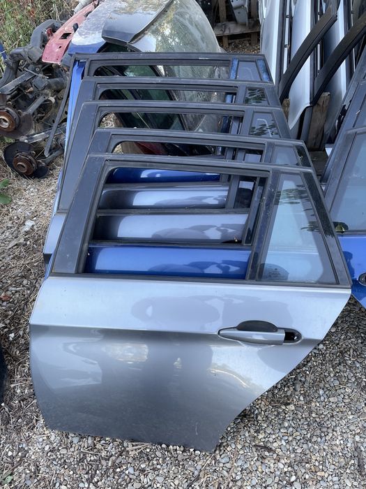 Usa stanga spate bmw e91 portiera stanga spate bmw e91