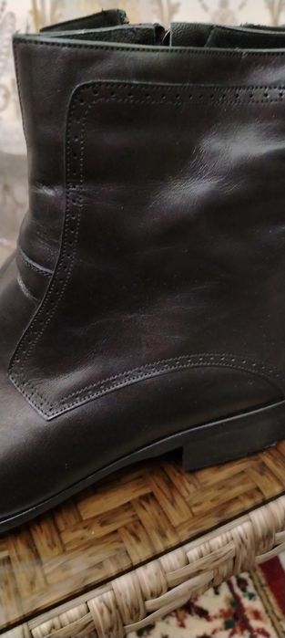 Новые, из натуральной кожи и меха, 42 размер.