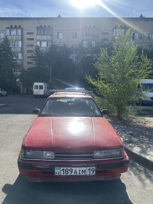 Мазда 626.