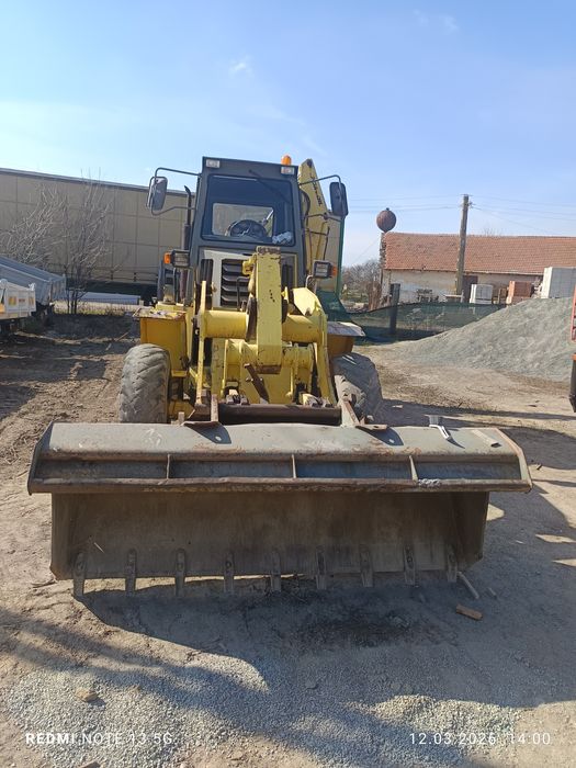 Buldoexcavator.inarcator frontal