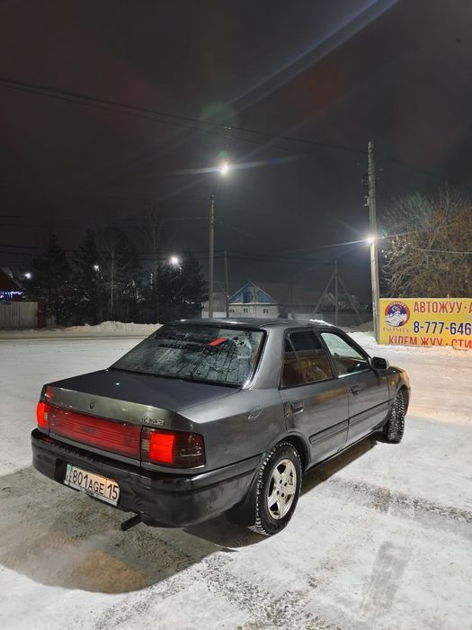 Машина мазда 323