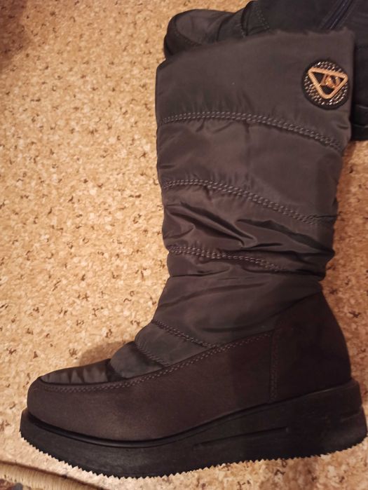 Продам сапоги дутыши