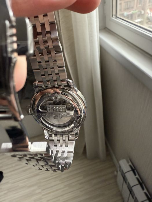 Tissot серебрянные часы