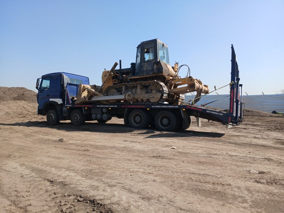 Грузовой эвакуатор или трал