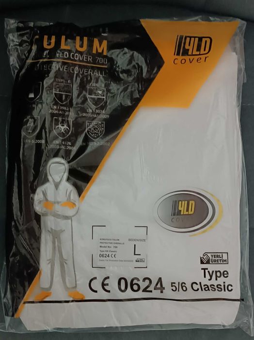 Защитный комбинезон одноразовый