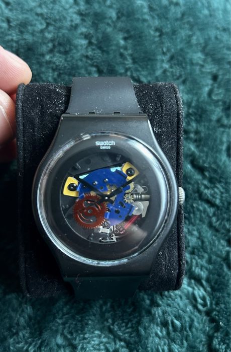 Swatch прозрачен часовник