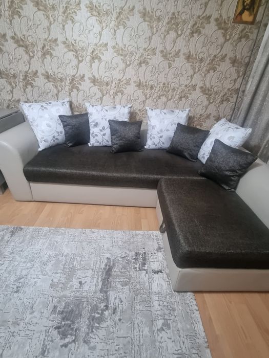 Colțar extensibil cu spațiu de depozitare