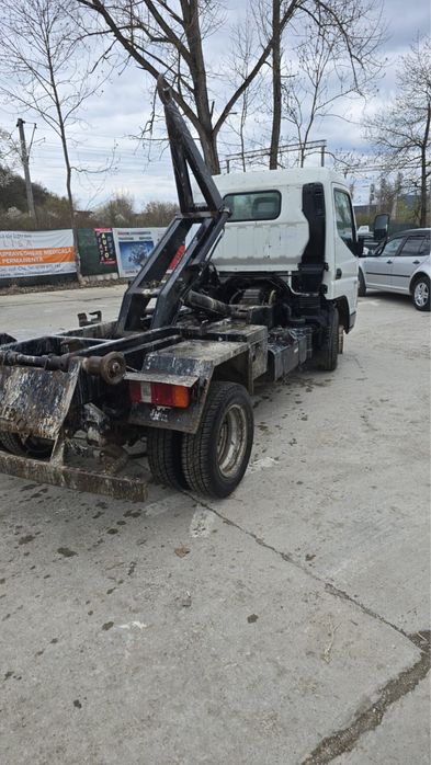 Mitsubishi Canter cu carlig abrollkipper