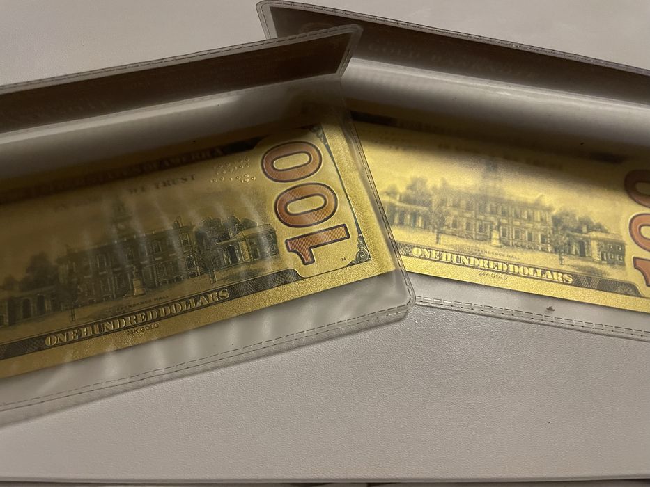 Bancnote 100 dolari aurite