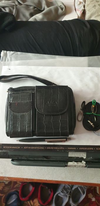 Продам мужскую барсетку.