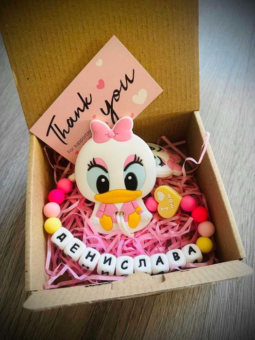 Клипс за биберон с гризалка