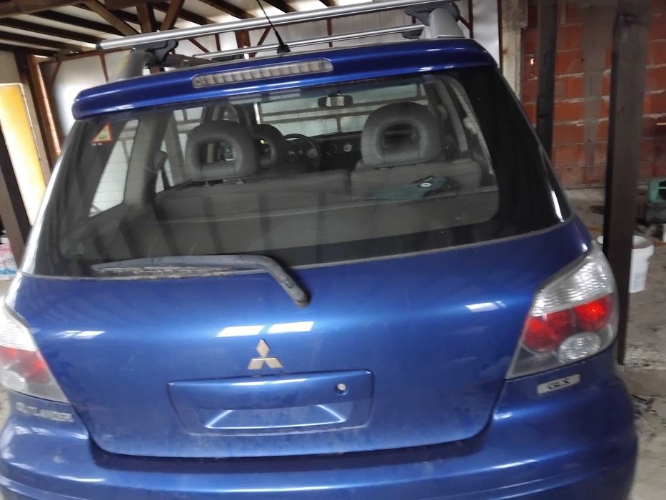 Мицубиши  олтлендър