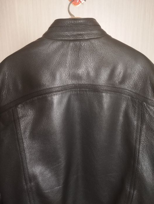 Новая кожаная куртка.