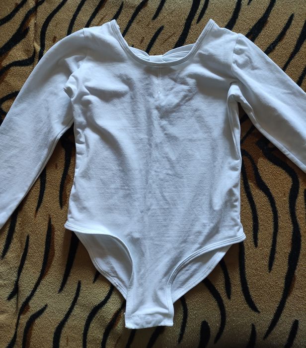 Продам гимнастический купальник на девочку