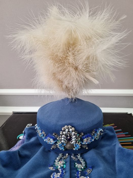 Кәжекей мен  тақия